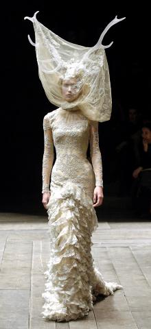 V%26A_AQ_Tulle_and_lace_dress_with_veil_and_antlers_Widows_of_Culloden_AW_2006-07._Model_Raquel_Zimmermann__%282%29.jpg